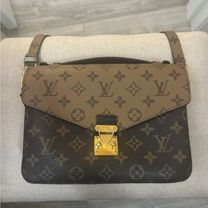 LOUIS VITTON Pochette Métis